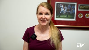 Woman discussing her positive experience taking Pilates classes at EW Motion Therapy.