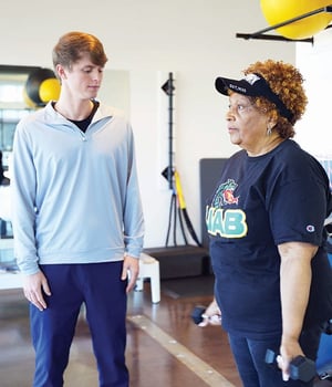 Women recieving personal training from a physical therapist at EW Motion Therapy
