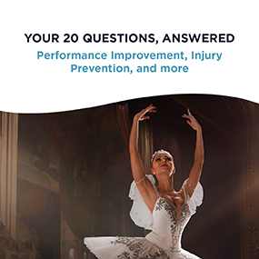 Ballet dancer in a white tutu with arms raised overhead, representing EW Motion Therapy's free dance guide on performance improvement and injury prevention