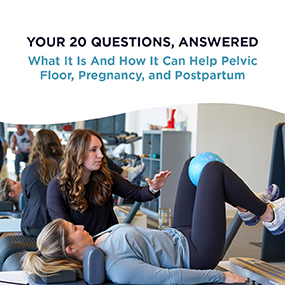 Women's health physical therapist guiding a patient through a pelvic floor exercise in a clinical gym setting, representing EW Motion Therapy's free guide on pelvic floor, pregnancy, and postpartum physical therapy